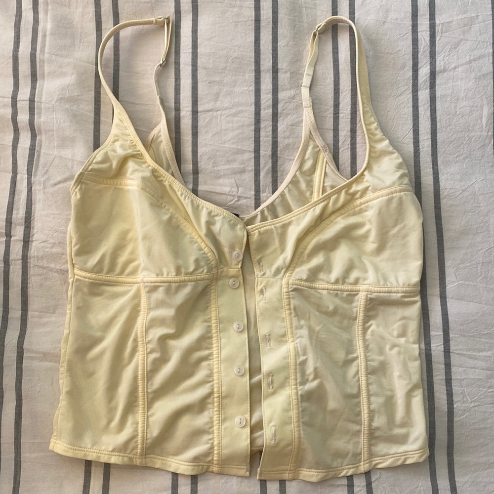 Cream, sheer bustier.